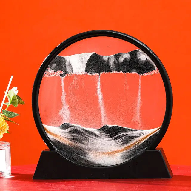 Decorative plate with mountain and water design on a stand against an orange background